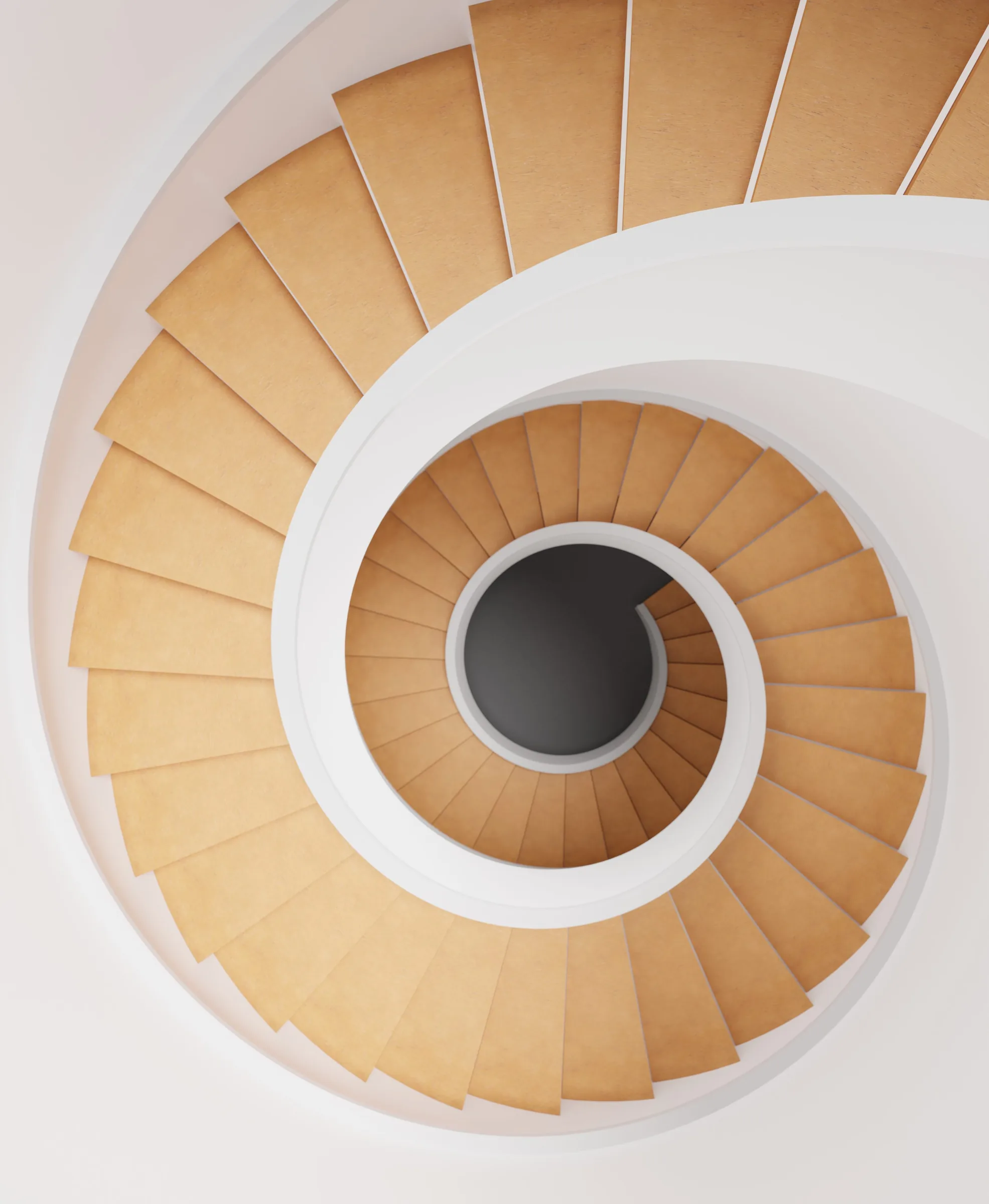 Spiral staircase in plywood and white steel seen from above